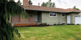 Spacious 4 Bedroom Home with Granite Kitchen, Main-Level Primary Suite, Two Living Areas & Outdoor Patio Gallery 1