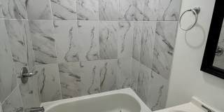 Stylish 2-Bedroom Unit Featuring Decorative Fireplace Gallery 13