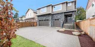 Luxury NW Living: 4 Bedroom Masterpiece with Dual Suites and Private Yard in Desirable Browns Point! Gallery 1