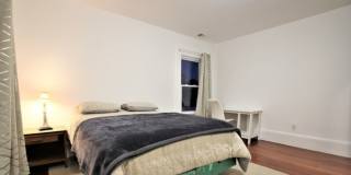Huge Townhouse near T w Laundry in Unit!  30 Foot Ceilings in Living Room! Gallery 4
