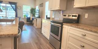 On the hunt for a beautiful, open floor plan home to rent close to downtown? Gallery 6