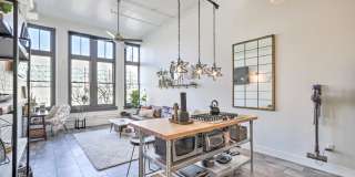 Historic Downtown Loft | Secure Garage Parking, Rooftop Access & Turn-Key Options Gallery 1