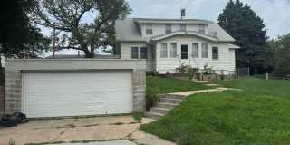 Spacious 4-Bedroom Rental with 2-Car Garage and Optional Shop Gallery 1