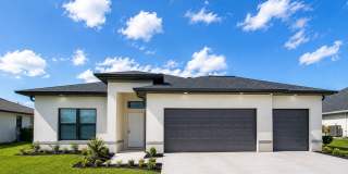 Brand-New Luxury Home with 3-Car Garage & Lawn Care Included | Modern Living in Cape Coral! Gallery 1