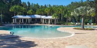 Well laid out 4 Beds/3Bths plus Den, screened Lanai on nature preserve in a well sort after K-Bar Range gated community! Gallery 44