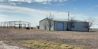 3 bedroom 2 bathroom Barn dominium on 10 acres! Half off First Month's Rent!! Gallery 1