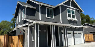 Coming soon! 2 bed 1 bath townhome with attached garage Gallery 1