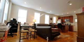 Nicely renovated Townhouse in a prime location near the Green Line with parking included! Gallery 3