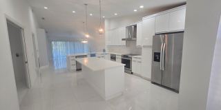***Ask about the TWO WEEKS FREE**WHAT A VIEW from your own private screened in balcony!!   Stunning HIGH-END Remodeled 3-Bedroom\2 bath Condo with Water & Golf Course Views – Lely Resort Gallery 1