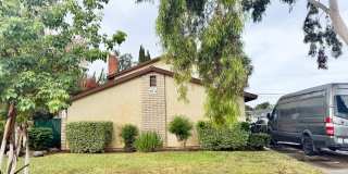 Newly Renovated Upstairs Unit – Garage & Carport Included! Gallery 1
