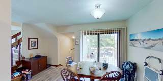 2 BR, 1.5 BA Clive split level duplex.  Deck and one car attached garage. Gallery 3