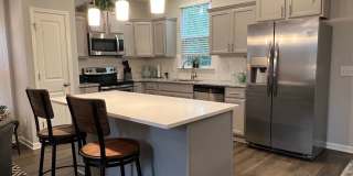 UNFURNISHED Three Bedroom Wellstone Model Home Gallery 1