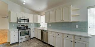 AVAILABLE FOR IMMEDIATE MOVE-IN!  Bright, open-concept Ahwatukee home with beautiful wood flooring. Tour today, move in right away! Gallery 1