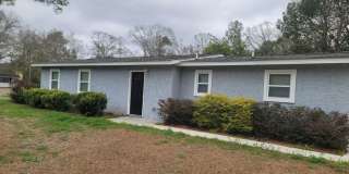 RENOVATED 3/2 w/ Den, Granite Counters, Stainless Appliances, Washer/Dryer, & Plank Vinyl Floors! Furnished or Unfurnished, Inc Lawn Maint! Avail NOW for $1775/month! Gallery 23