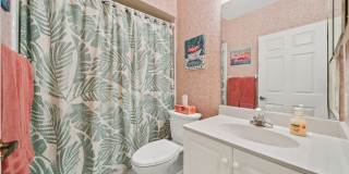 first-floor unit featuring a 2 bedroom, 2 bath fully furnished Gallery 13