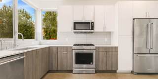 3 Bedroom Modern Industrial Townhome with City Views & Rooftop Oasis Gallery 6