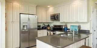 Stunning 2/1 available now at Waterside at Coqunia Key! Gallery 13