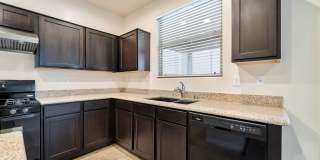 Stylish Two-Story Retreat with Designer Kitchen, Private Backyard & Flexible Living Space! Gallery 8
