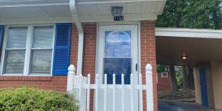 Private carport, in-unit laundry, and the Lakewood strip right outside your door. Gallery 2