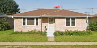 Spacious 2 Bedroom, 2 Bath Home with Bonus Space and a Double Car Garage Gallery 1