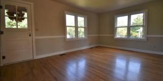 4 bed/3.5 bath, half acre lot, 100 yards from Memorial Stadium! Gallery 1