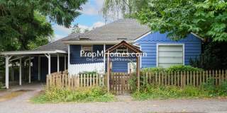 Charming 3-Bedroom Bungalow in the Heart of First Addition! Gallery 1