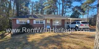 Great Brick Ranch / Harwood Floors / Huge Shop or Extra Storage / No Garage / Great Private Back Yard/ Great Location Gallery 1