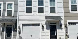 3 bedroom town home with a finished basement and garage located in popular Preston Lakes Gallery 1