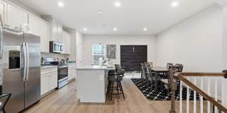 Welcome to this like new fully furnished home located in The Village at Courthouse Commons in Spotsylvania. Gallery 11