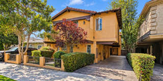 SPACIOUS & SECLUDED, SPANISH MEDITERRANEAN REAR UNIT TOWNHOUSE W/ LARGE ROOFTOP DECK W/ OCEAN/PV VIEWS, 2 BALCONIES, WRAP AROUND YARD & 2-CAR GARAGE ON CUL-DE-SAC STREET CLOSE TO SCHOOLS, SHOPPING, RB PIER & BEACH! Gallery 1