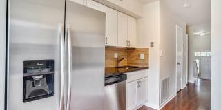 Updated 4 level TH w/ 2 FB & 2 "1/2" baths + One car garage! Gallery 4