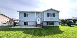 Pet Friendly 4 Bed 2 Bath Single Family Home W/ Fully Fenced Yard, Double Car Garage Located in East Helena! Gallery 1