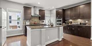 Welcome to 9618 Stockwell Lane—an exceptional 3-level, 4-bedroom, 3.5-bath townhome in the heart of Fairfax that has been thoughtfully updated to offer both style and functionality. Gallery 14