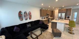 Modern Furnished Optional 3 Bedroom Townhome in Prime Southern Highlands Location Gallery 1