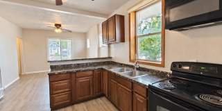 Charming 2-Bedroom SLC Home with In-Unit Laundry & Large Backyard Gallery 1