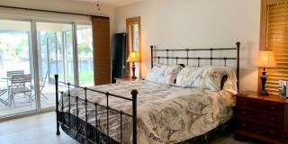 AVAILABLE 2027 SEASON! ! PGI HEATED POOL, WATERFRONT, BOAT LIFT Gallery 26