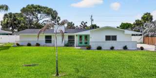 Welcome to this beautifully remodeled 4-bedroom, 3-bath home in the heart of Indialantic Beach! Gallery 1