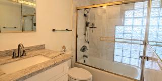 Sweeping Views from this partially furnished 1 Bed 1 Bath Condo w/ 1 Covered Parking Gallery 8
