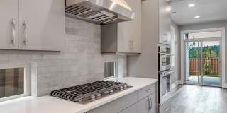 Bethany Stunner - 5 Bedrooms with Main-Level Bed & Bath, Modern Kitchen & Private Fenced Yard Gallery 4