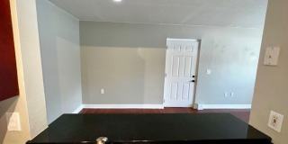 MOVE IN NOW!! Gated community Miriada! 1st floor 1X1.5 bath condo near pool area!!! Laminate wood flooring in living area and carpet in bedroom! Has washer & dryer! Gas stove & water heater! Gallery 14
