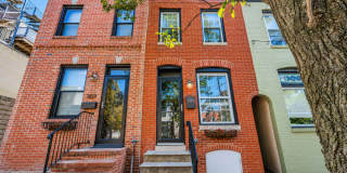 Charming Baltimore Rowhome with Exposed Brick & Private Patio Gallery 1