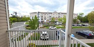 Beautiful 2nd floor (with elevator services) condominium: 2-bed, 2-bath, beautiful kitchen, bonus room, laundry room & deck! Gallery 29