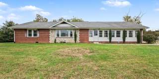Charming Rambler with 2 Primary Suites with Fenced in Yard Gallery 1