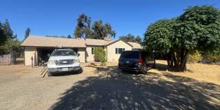 Charming 3-Bedroom Home with Spacious yard and Business Potential Gallery 1