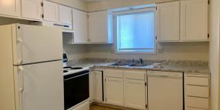 2 bed, 1 bath Duplex with attached garage Gallery 1