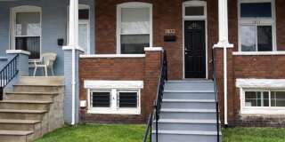 3BR Baltimore Rowhome with Central Air  In-Unit Laundry Gallery 1