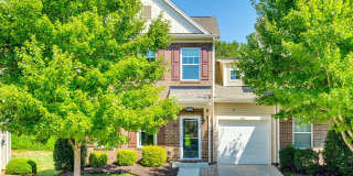 This 3-bedroom, 2.5-bath end-unit townhome in the gated community of Harpers Green is a Gem! Gallery 1