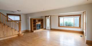 Bright, beautiful home with 3 garage spaces & tons of storage! Gallery 11