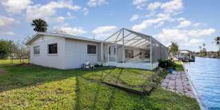 Beautiful canal front home with dock! Gallery 21