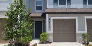 Brand NEW 3 Bed/2.5 Bath Townhome that was constructed just this year! Lawn & Internet INCLUDED in rent! Gallery 1